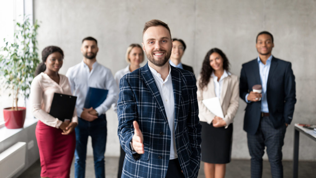 Smiling Businessman Stretching Hand For Handshake Greeting In Office, Panorama