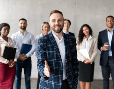 Smiling Businessman Stretching Hand For Handshake Greeting In Office, Panorama